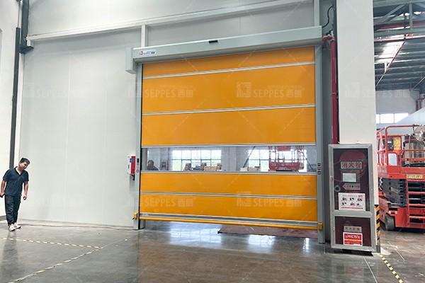 How does the high speed door work in conjunction with the AGV?