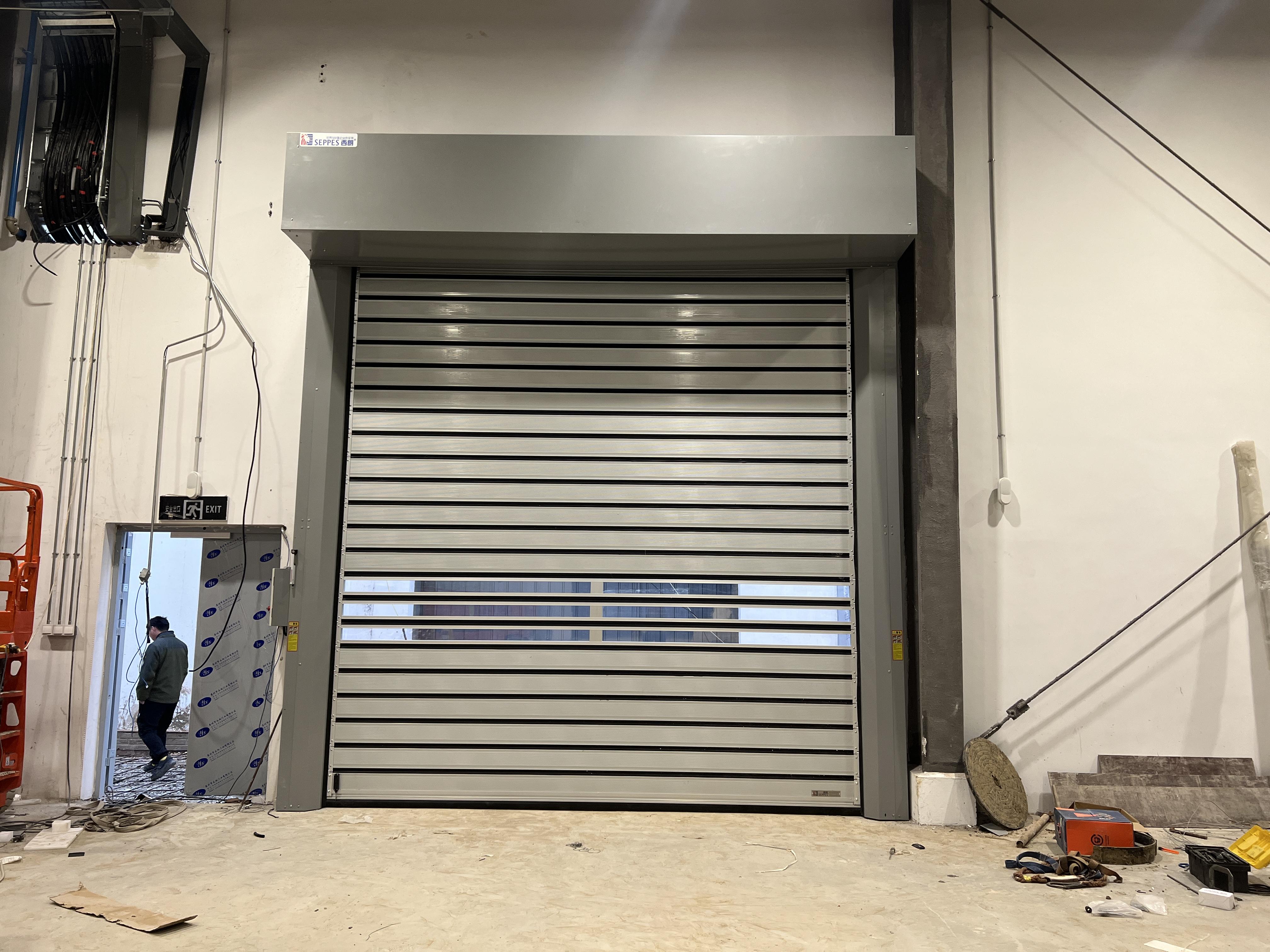 The advantages of installing high speed spiral door in construction factories