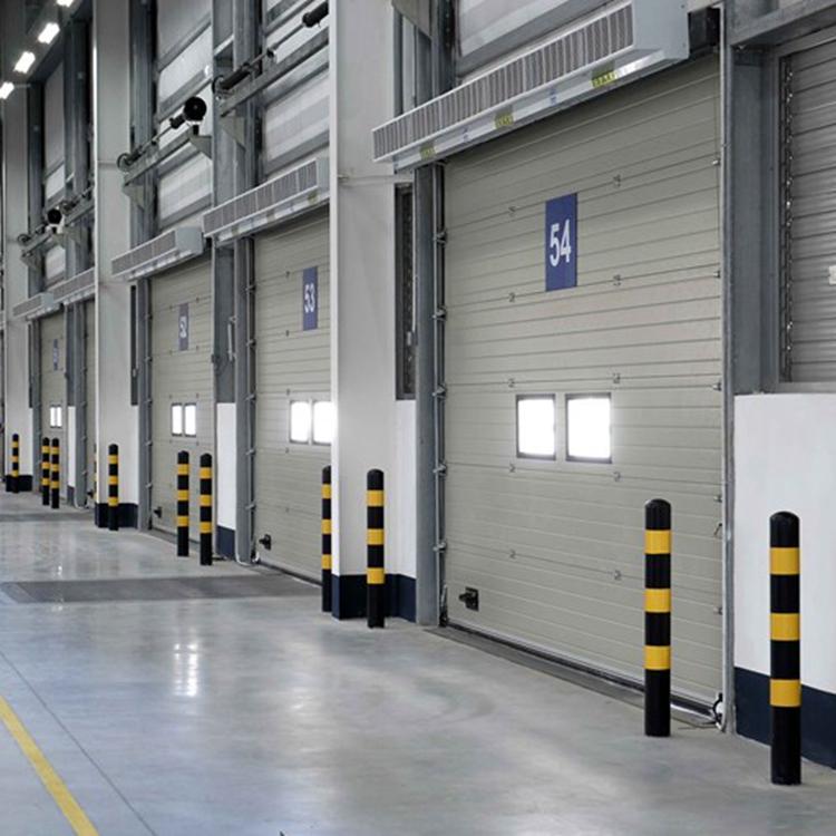 How should industrial sectional door be maintained?